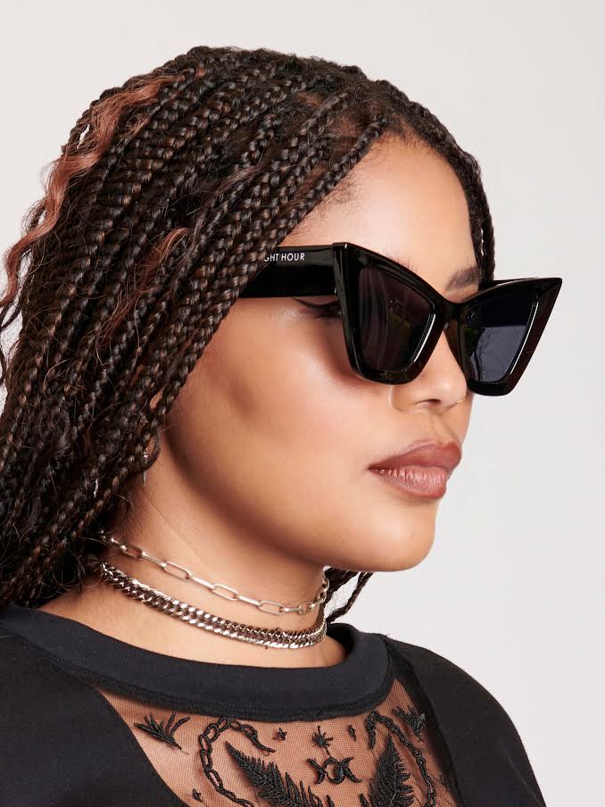 Black cat eye sunglasses with midnight hour logo