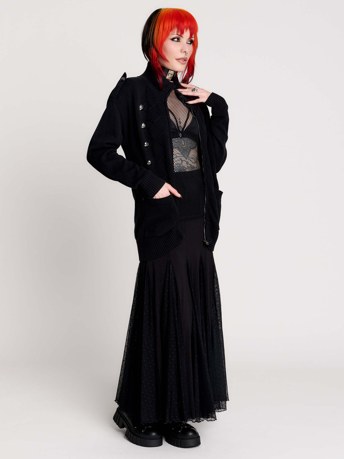 black zip-up knitted cardigan with ilver tones buttons and pockets