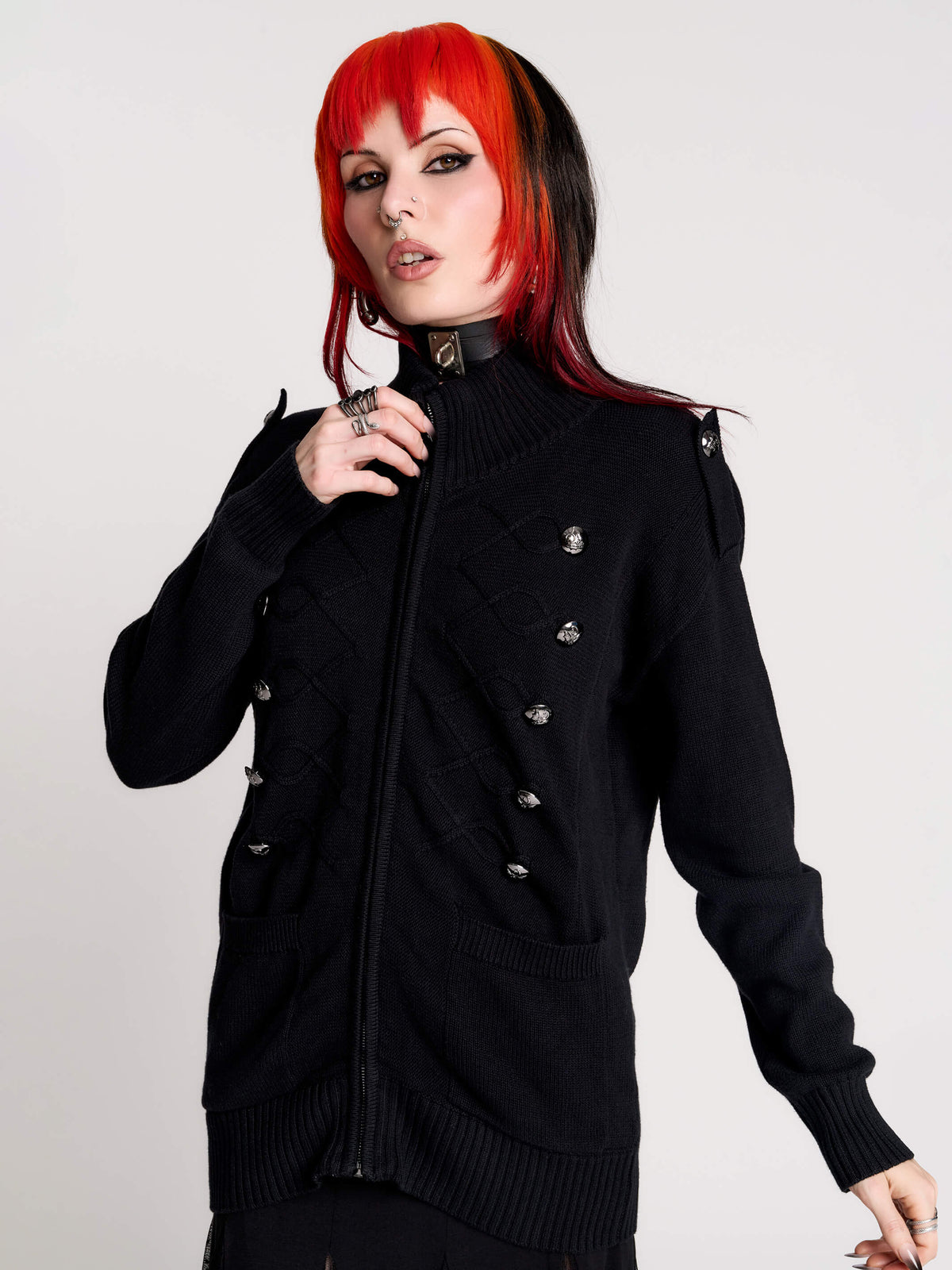 black zip-up knitted cardigan with ilver tones buttons and pockets