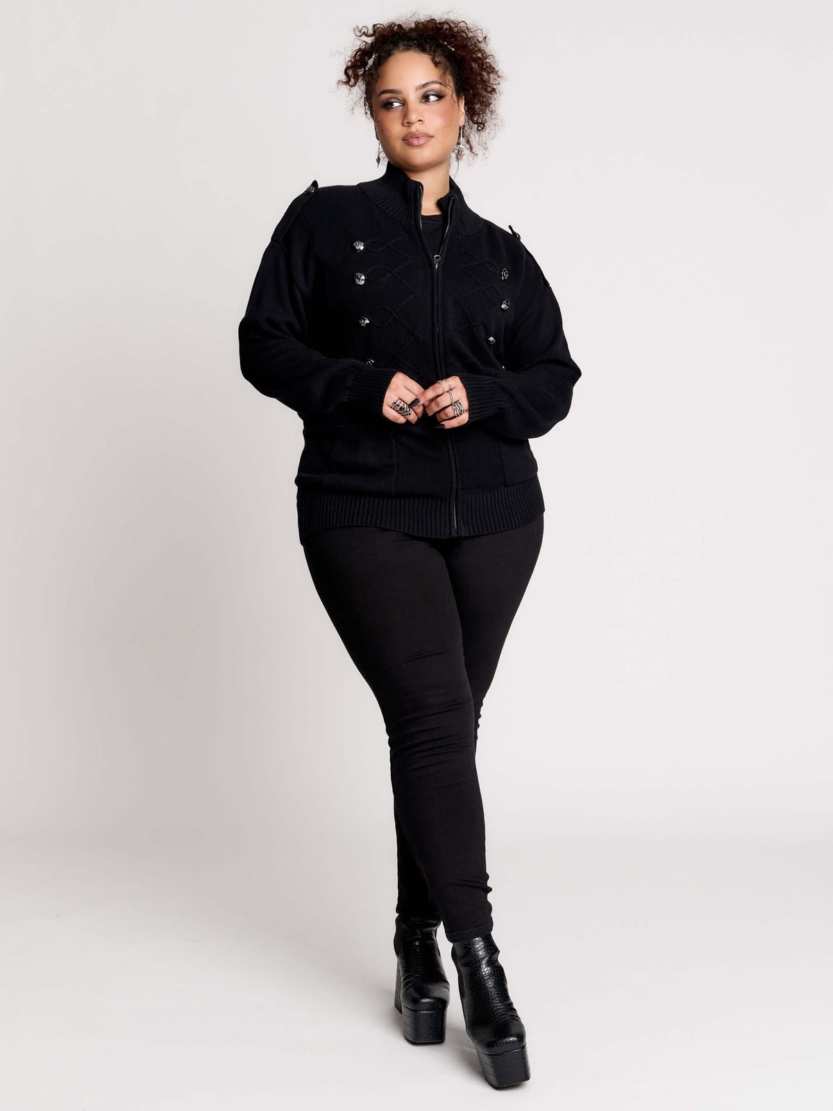 black zip-up knitted cardigan with ilver tones buttons and pockets