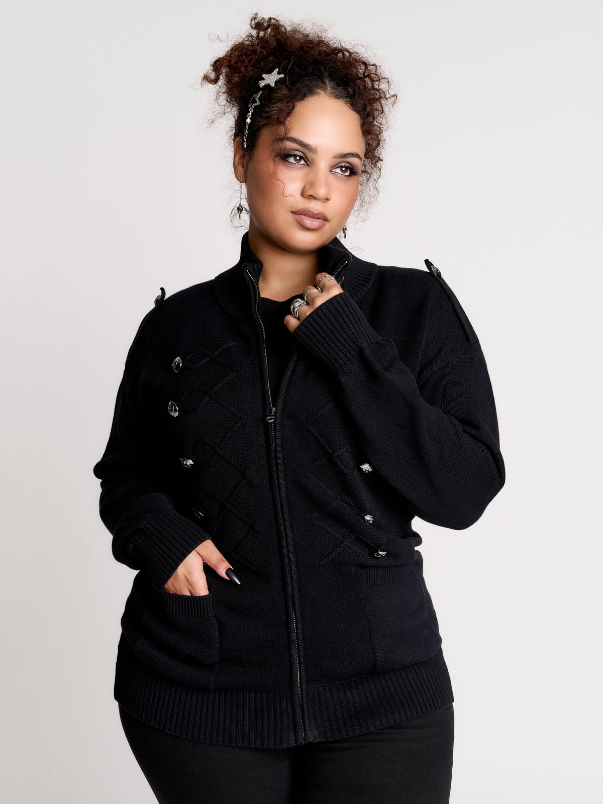 black zip-up knitted cardigan with ilver tones buttons and pockets