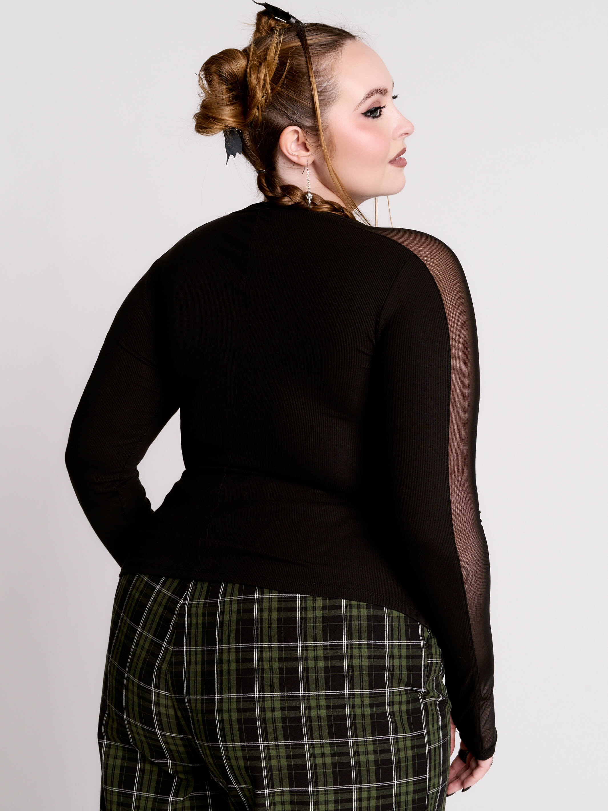 black long-sleeve top with sheer mesh sleeves