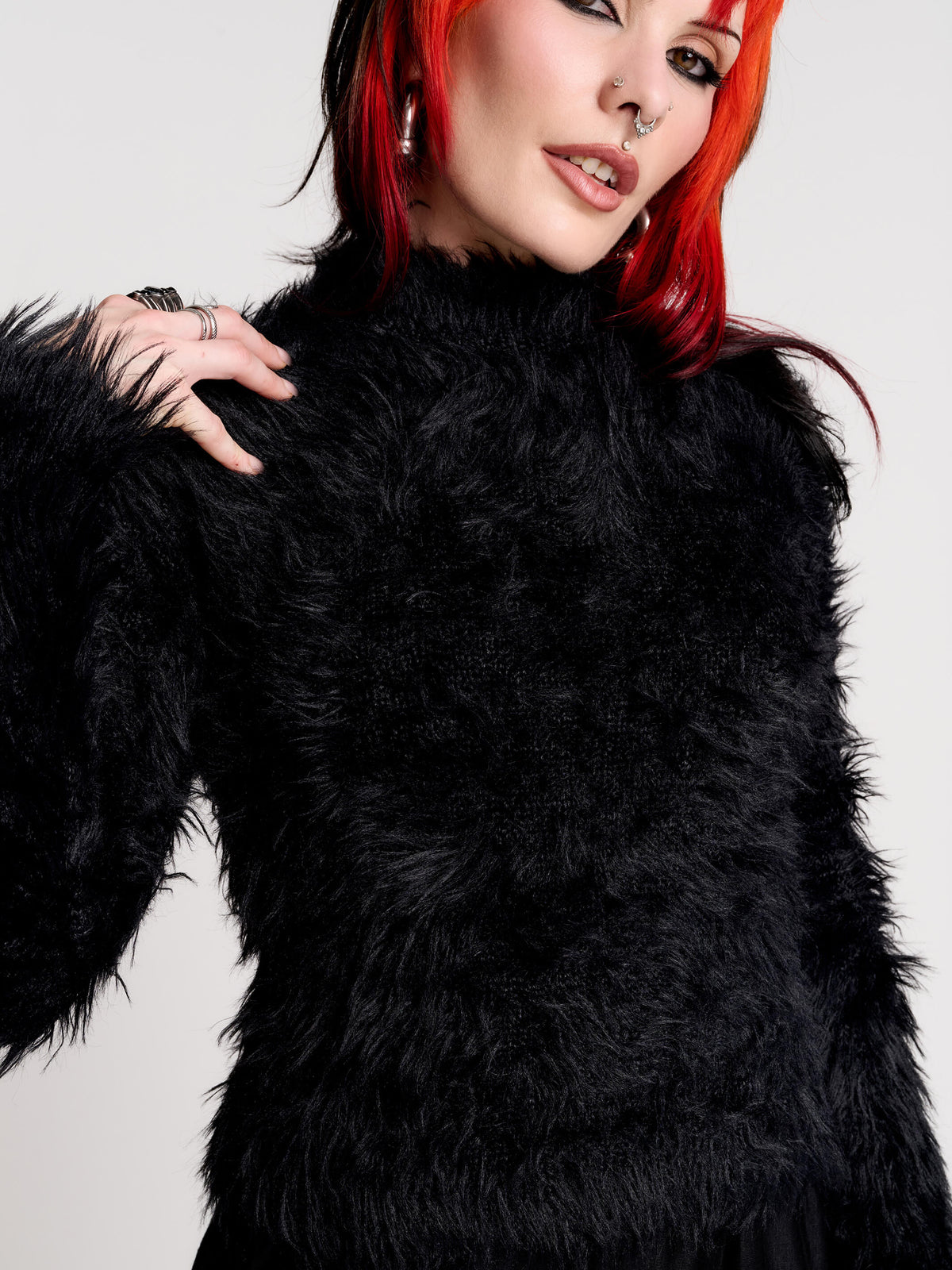 black fuzzy faux-fur mock-neck sweater