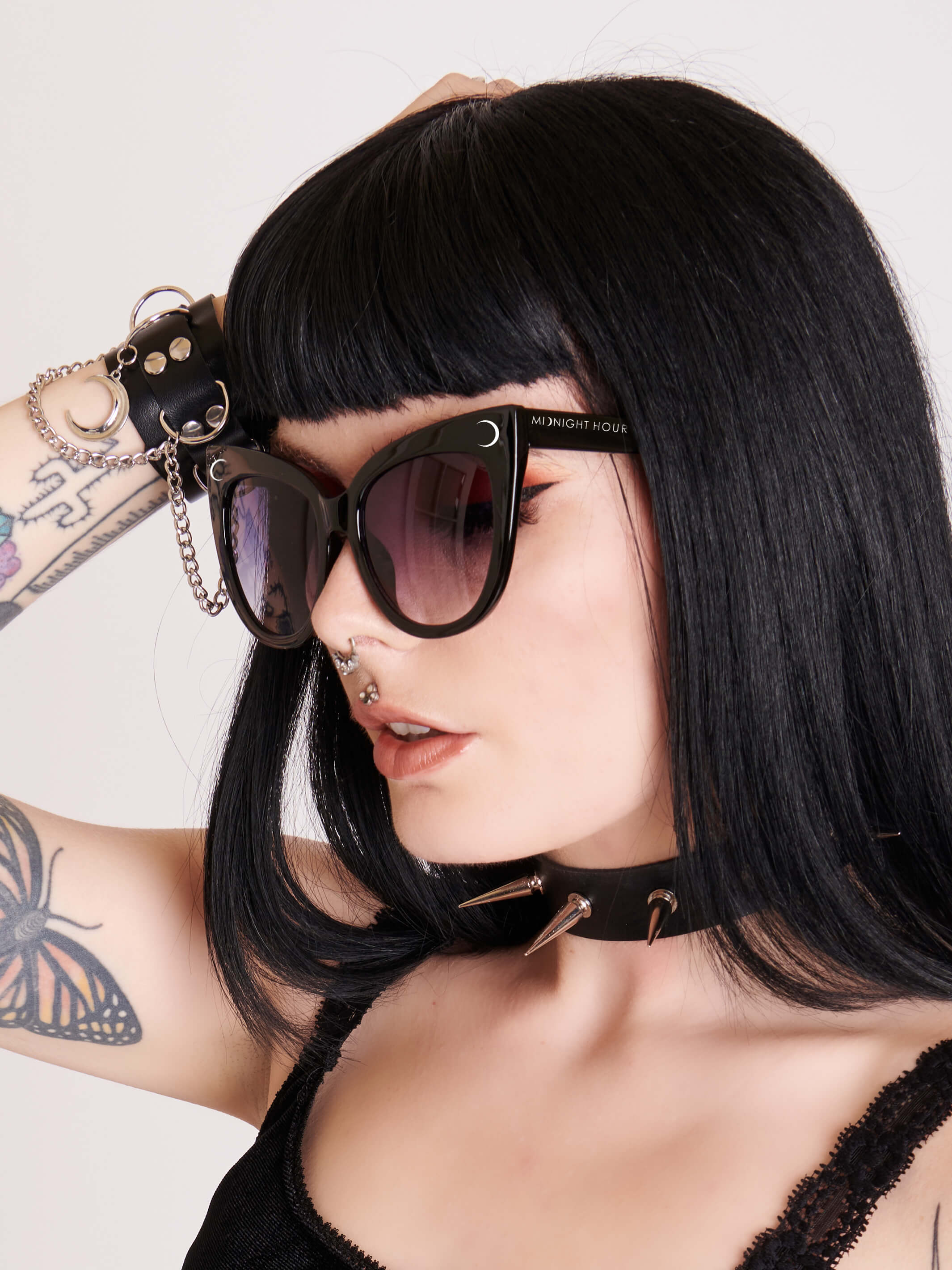 oversized cat eye sunglasses and with clean slick lines, featuring our signature Crescent Moon Logo on front right corner and Midnight Hour logo on the side.