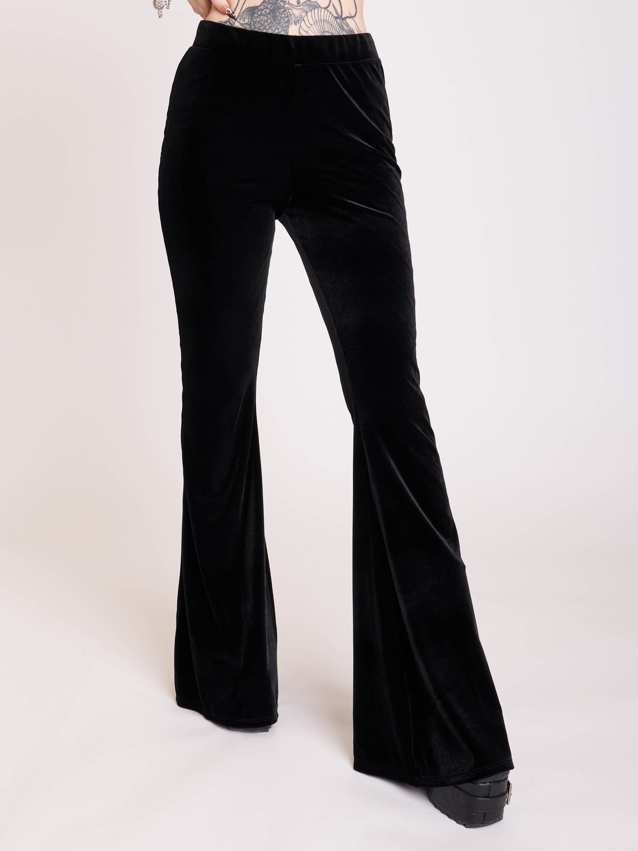 Gothic Black stretch velvet flared legging pants.