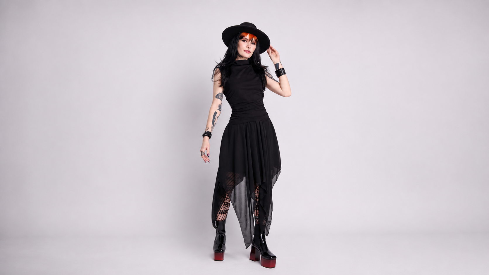 Woman wearing Sleeveless Shirred Top by Midnight Hour