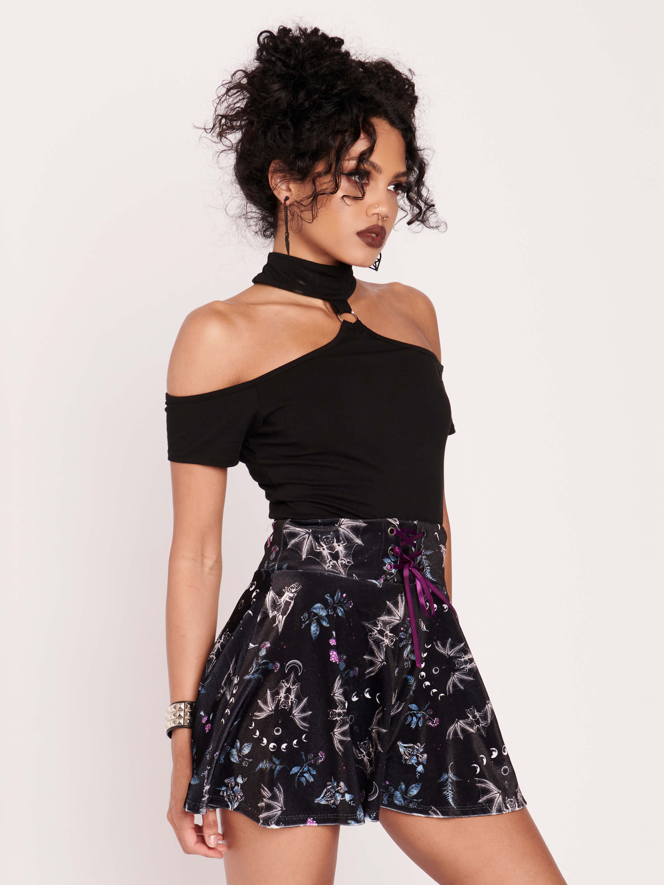 girl in goth crop top