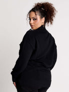  black zip-up knitted cardigan with ilver tones buttons and pockets