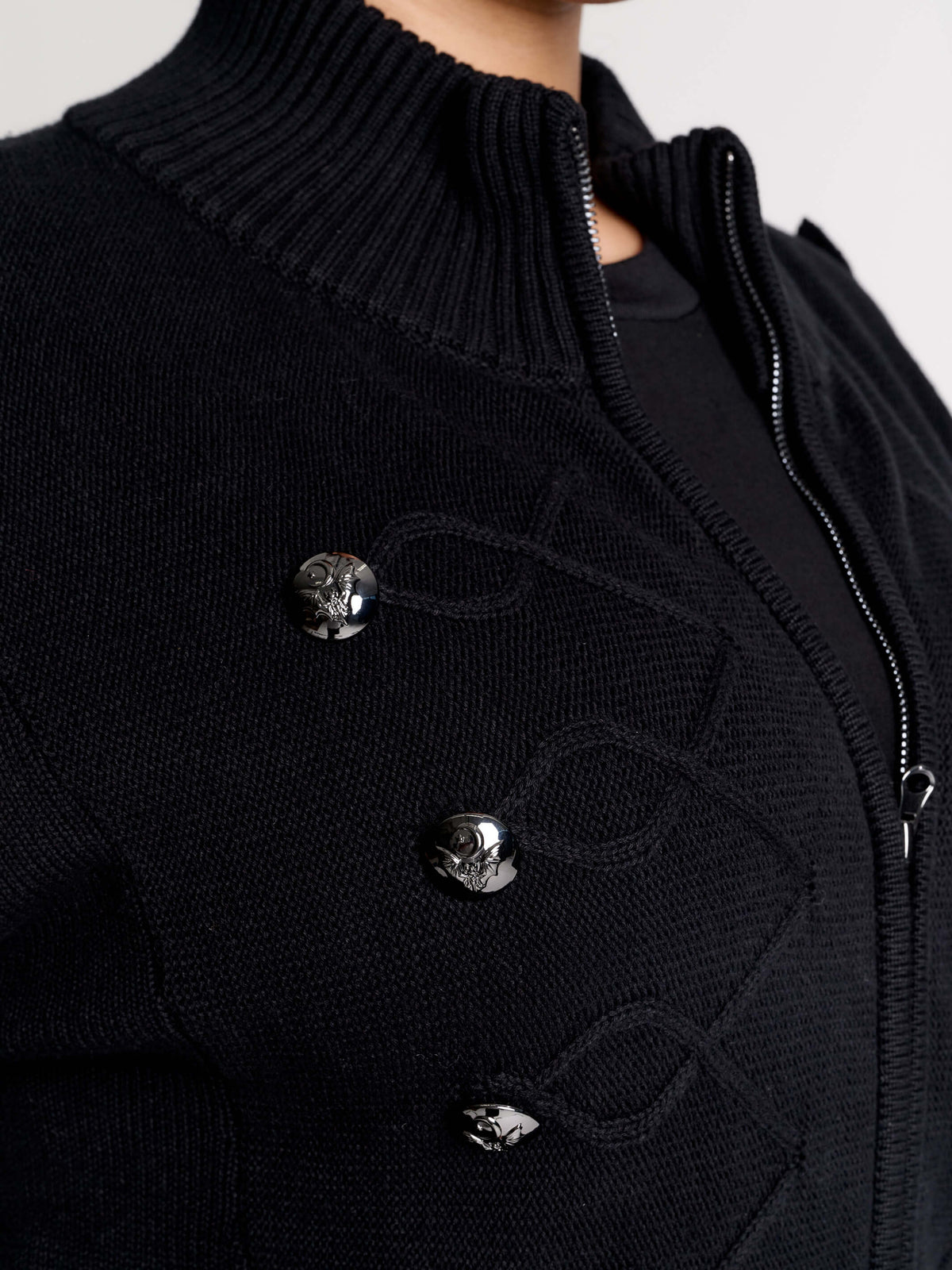  black zip-up knitted cardigan with ilver tones buttons and pockets