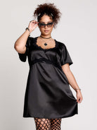 black satin short-sleeve dress with lace trim
