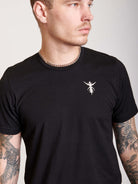 Black T-shirt with back angel wing and spine detail