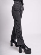 EMBROIDERED DISTRESSED DENIM