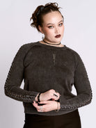 distressed braided sweater