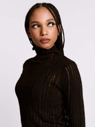 Distressed striped drop needle sweater