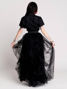 black short-sleeve blouse with white embroidered bat on collar and black lace trim