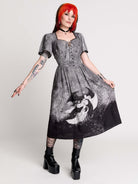 a short-sleeved gray and black gothic-style dress with a printed illustration of a winged figure