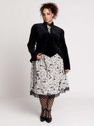 black velvet jacket with a black-and-white patterned lining