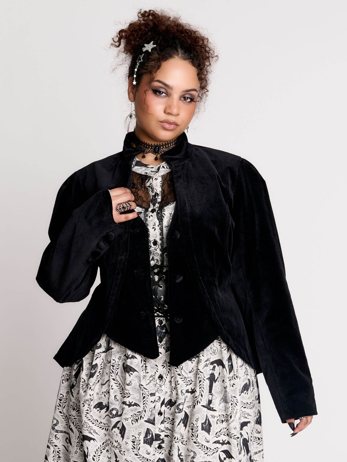 black velvet jacket with a black-and-white patterned lining