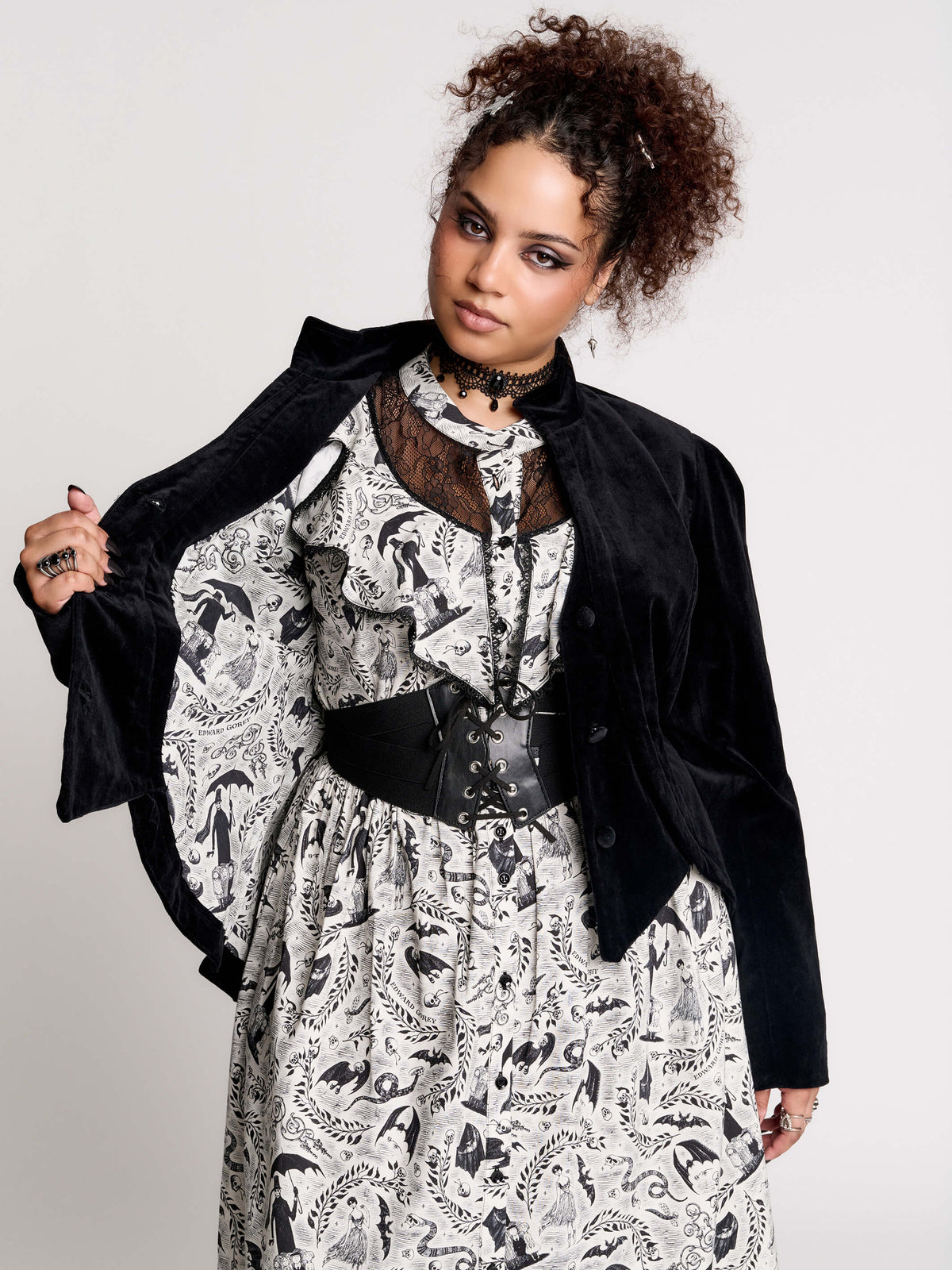black velvet jacket with a black-and-white patterned lining