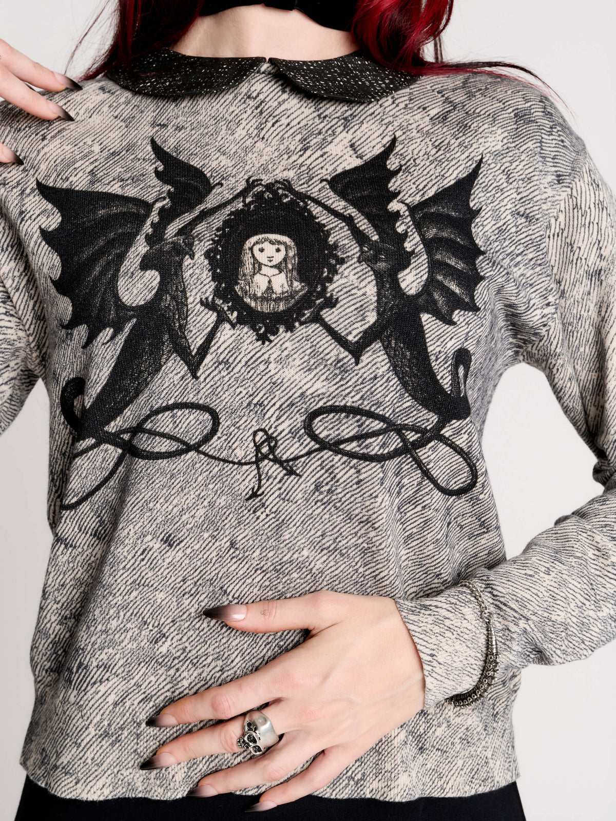 gray marled long-sleeve shirt with a black dragon graphic and a printed Peter Pan collar