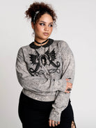 gray marled long-sleeve shirt with a black dragon graphic and a printed Peter Pan collar