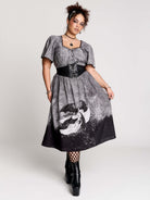 short-sleeved gray and black gothic-style midi dress with a printed illustration of a woman and winged figure at the hem