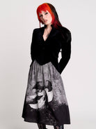 black velvet jacket with a black-and-white patterned lining