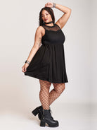 Black fishnet dress with pockets