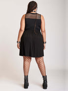 Black fishnet dress with pockets