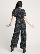 FLORAL SNAKE JUMPSUIT