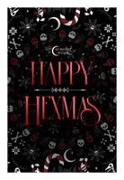 A gothic-themed Halloween greeting card or poster featuring the text 'HAPPY HEXMAS' in large red letters on a black background, surrounded by skulls, candy canes, snowflakes, and occult symbols. The 'Midnight Hour' brand logo is visible at the top center.