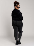black fuzzy faux-fur mock-neck sweater