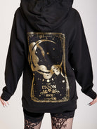 Black hoodie with gold moon tarot card graphic