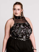 A black sleeveless top with a high mesh neck and an allover gothic-style print featuring silver snakes, moths, ravens and small pink floral accents.