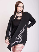 Black cardigan with snake skeleton art.