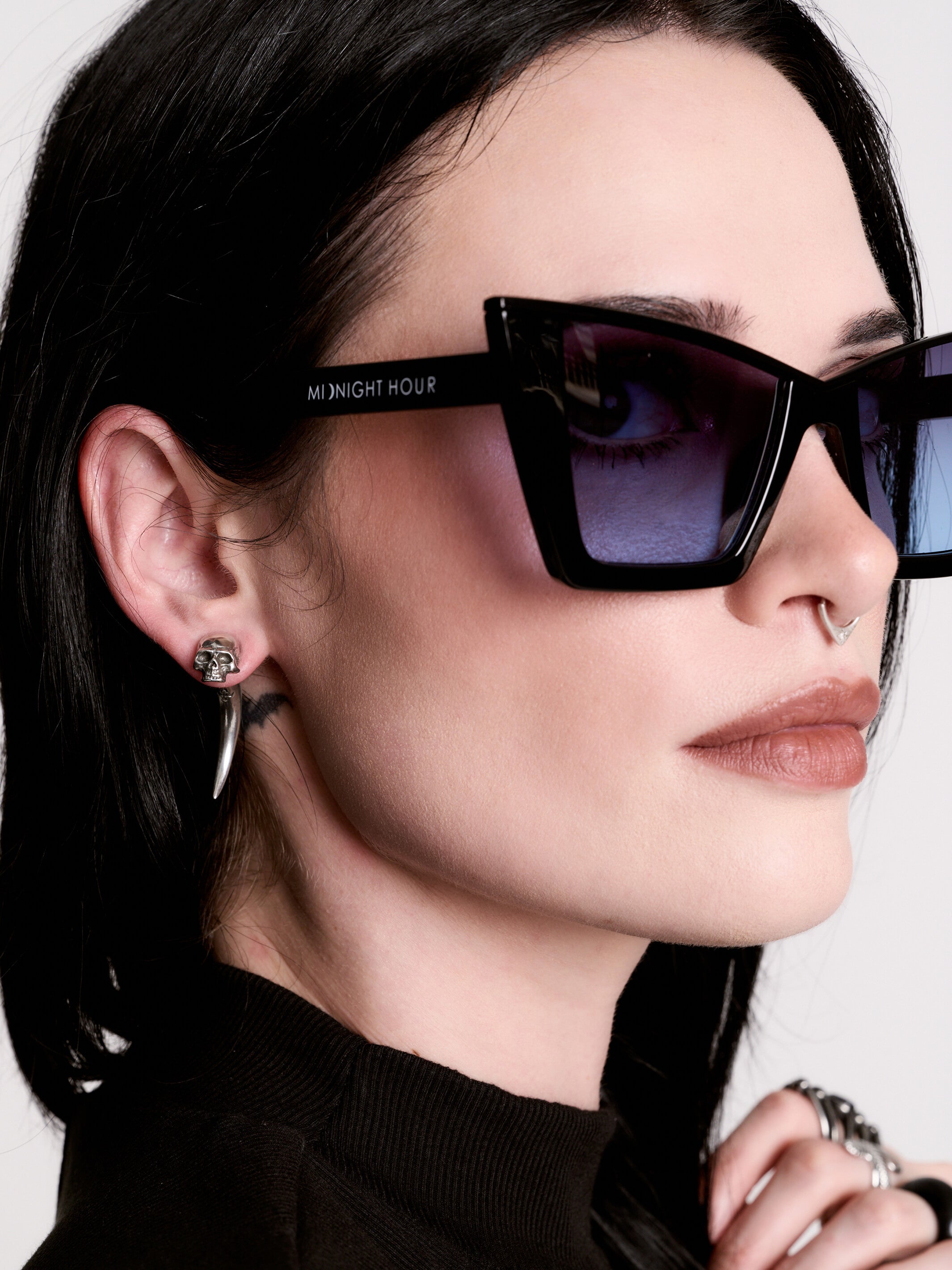 Skull horn earring