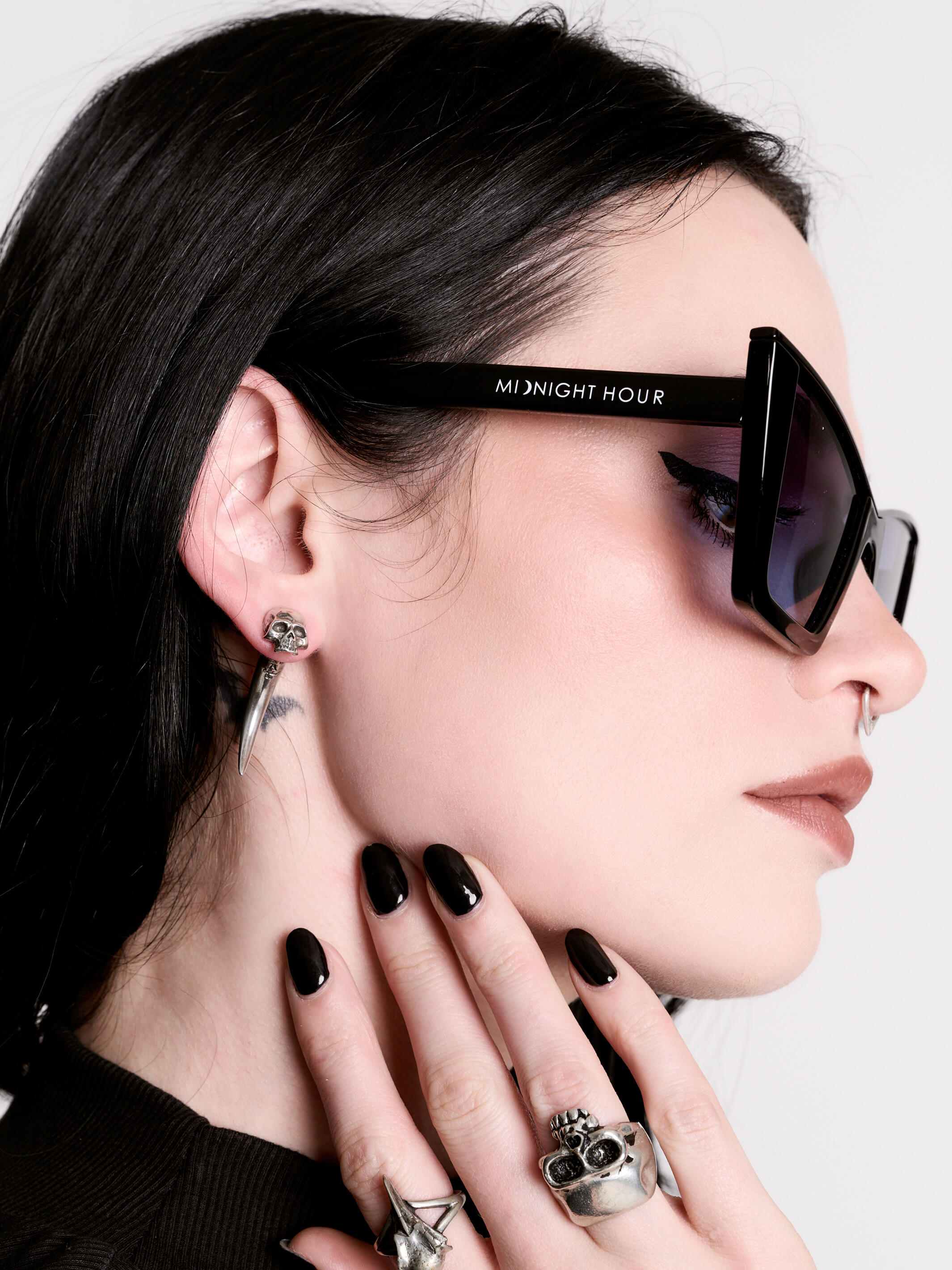 Skull horn earring
