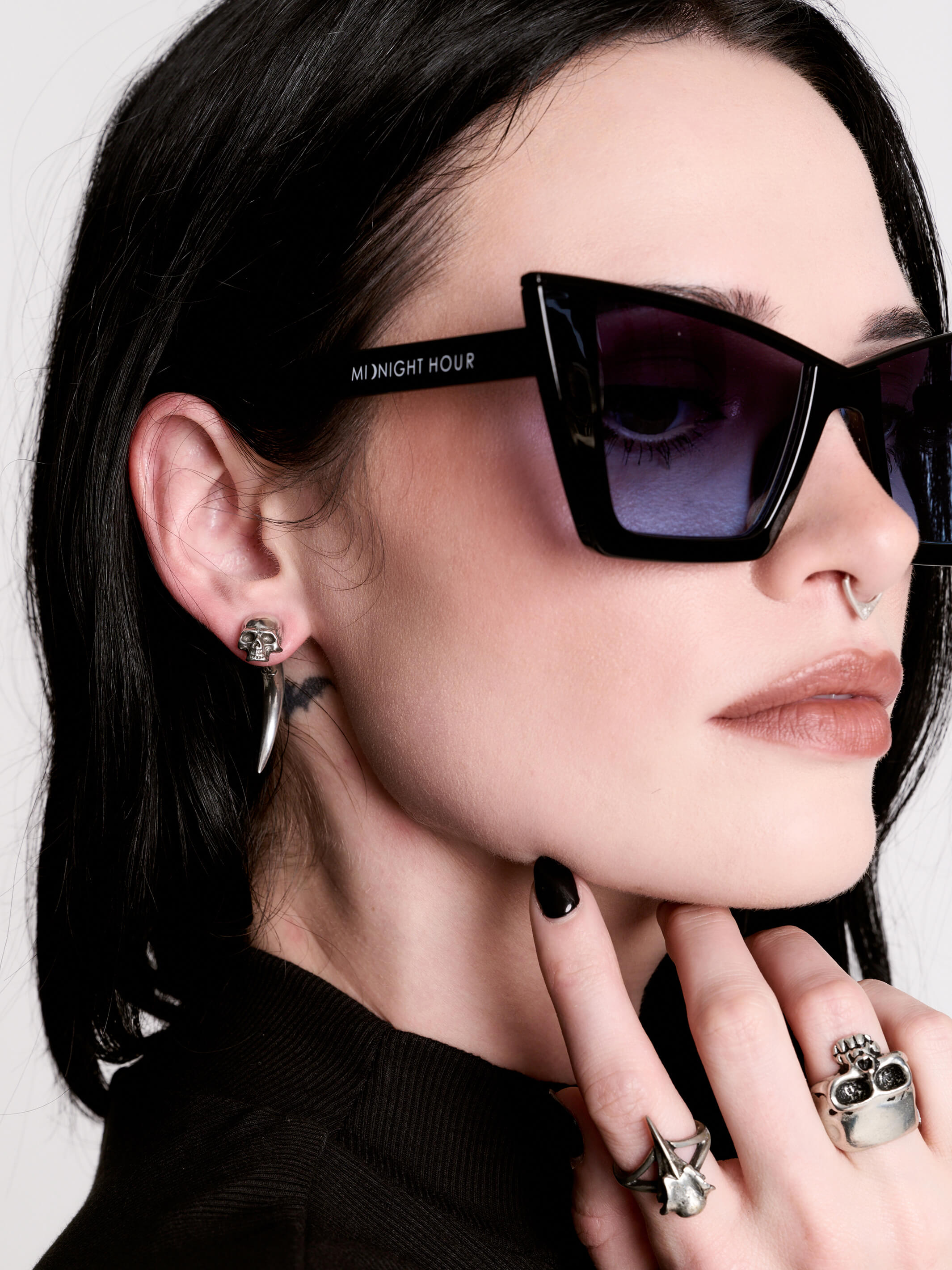 Skull horn earring