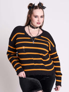 orange and black stripe distressed sweater