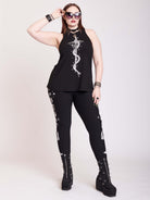 BLACK LEGGING WITH WHITE GRAPHIC FEATURING PRAYING SKELTON AND MOON PHASE