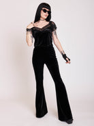 Gothic Black stretch velvet flared legging pants.