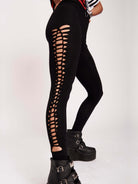 Stretchy cotton spandex leggings with slashed and braided side details. 