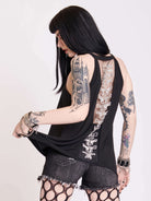 black tank with sheer back panel embroidered with spine motif