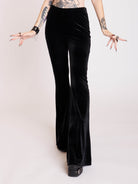 Gothic Black stretch velvet flared legging pants. 